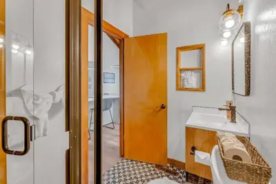 a bathroom with a sink and a mirror at Bright 3BR Condo Near Northstar in Truckee