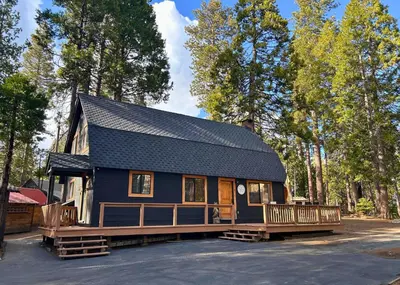 a tiny house with a gambrel roof at The Elderberry Retreat - It's a Dream Location! in Shaver Lake
