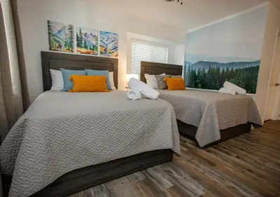 two beds sitting next to each other in a bedroom at Comfort meets Tranquility by the Sequoia Entrance in Three Rivers