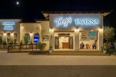 a store front of a shopping center at night at Comfort meets Tranquility by the Sequoia Entrance in Three Rivers