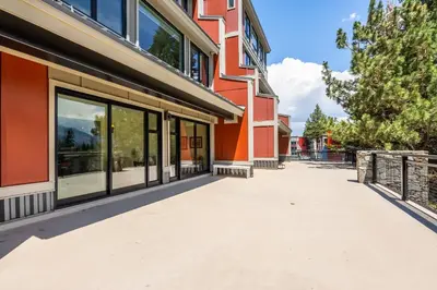 an empty sidewalk in front of a building at Updated 2 Bedroom 2 Bathrooms 1849 Condos #109 Steps to Canyon Lodge Sleeps 6 in Mammoth Lakes