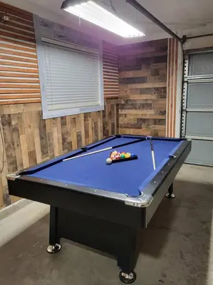 a pool table in a room with at 3 Bedrooms,Beautiful House with Hot Tub, Pool Oasis and Fire Pit in Clovis