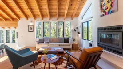 a living room with furniture and a fireplace at Trapper by AvantStay A Interior Design w Sauna in Alpine Meadows
