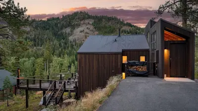 a cabin with a view of a mountain at Trapper by AvantStay A Interior Design w Sauna in Alpine Meadows