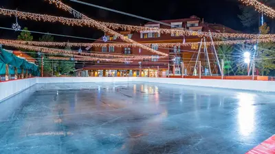 an ice rink at night with christmas lights at Marriott Grand Residence Luxury Studio sleeps 2 in South Lake Tahoe