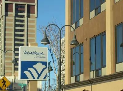 a sign in front of a building at Enjoy all Reno has to offer in this 2BD resort condo with outdoor pool or hot tub in Reno