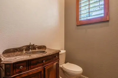 a bathroom with a sink and a toilet at Snowcreek IV 525 in Mammoth Lakes