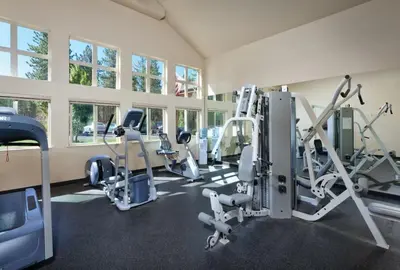 a gym with treadmills and machines in a room at Wyndham South Shore 2bd sleeps 6 in Zephyr Cove