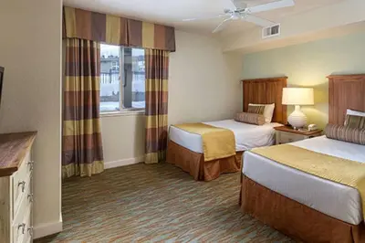 a hotel room with two beds and a window at Wyndham South Shore 2bd sleeps 6 in Zephyr Cove