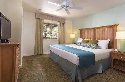 a bedroom with a large bed and a television at Worldmark South Shore 1Bd- sleeps 4 in Zephyr Cove