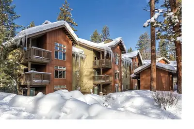 a large building with snow in front of it at Worldmark South Shore 2bd- sleeps 6 in Zephyr Cove