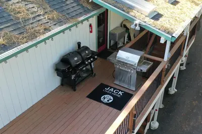 an overhead view of a grill on a deck at The Valley View- Pine Mountain Lake Cabin home in Groveland