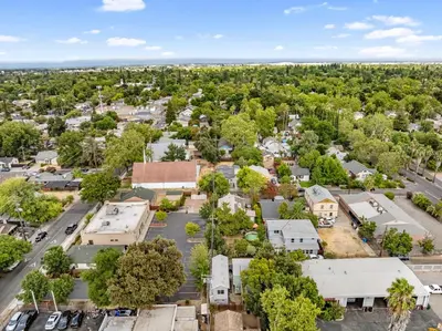 an aerial view of a small town with trees at Cozy 2bdr, 1br home near downtown in Sacramento