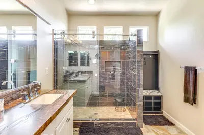 a bathroom with a shower and a sink at Game Room and Fireplace Reno Home 5 Mi to Dtwn! in Reno