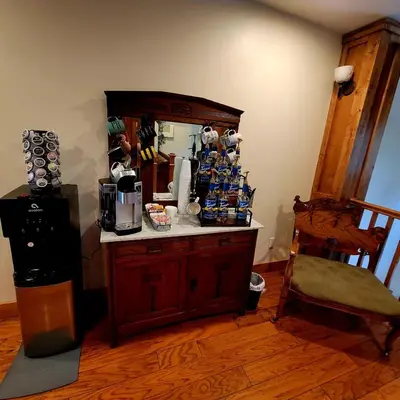 a room with a counter with a coffee maker at Kings River Reflections in Sanger