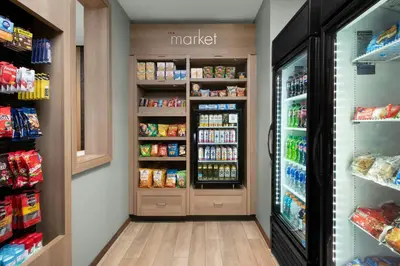 a walk in pantry with a refrigerator at Residence Inn by Marriott Sacramento Cal Expo in Sacramento