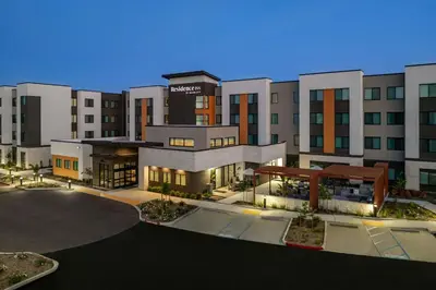 a rendering of the exterior of a hotel at Residence Inn by Marriott Sacramento Cal Expo in Sacramento