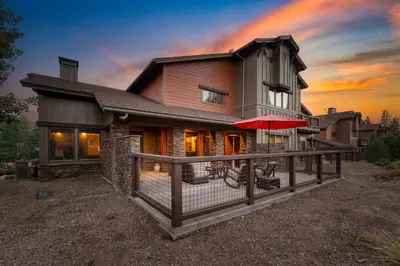 a house with a fence in front of it at Luxe All-Season Retreat by AvantStay Prime Location Near Skiing in Truckee