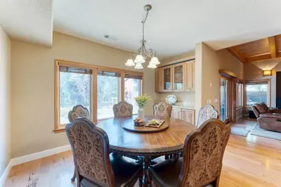 a dining room with a table and chairs at Luxe All-Season Retreat by AvantStay Prime Location Near Skiing in Truckee