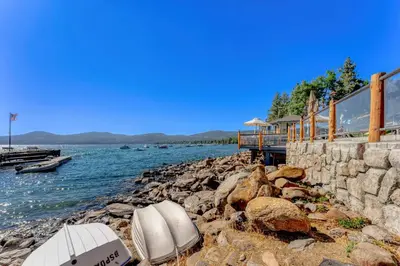 two boats on the shore of a body of water at Lake Tahoe Vacation Rental w Patio & Pool Access in Kings Beach