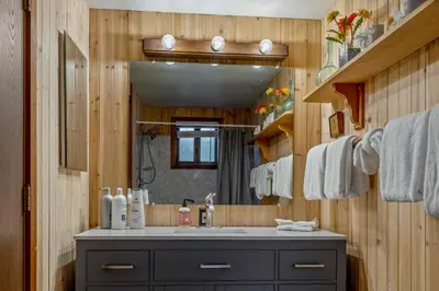 a bathroom with a sink and a mirror at Secluded Tahoe Retreat Near Trails and Beach in Carnelian Bay