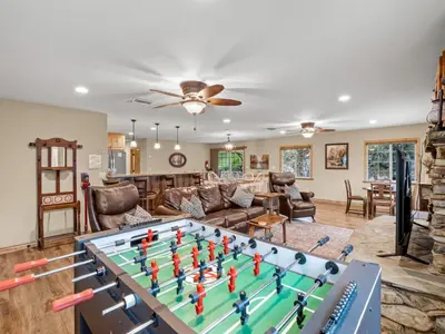 a living room with a foosball table at Manzanita Hill-35 miles to Yosemite, 10 miles to Mariposa with 8 person spa in Mariposa