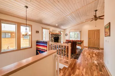 a living room with a wooden ceiling at Landfall on the North Shore - Fenced Yard, Walking Distance to Lake in Kings Beach