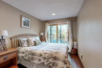 a bedroom with a bed and a window at Incline Haven in Incline Village