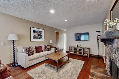 a living room with a couch and a table at Incline Haven in Incline Village