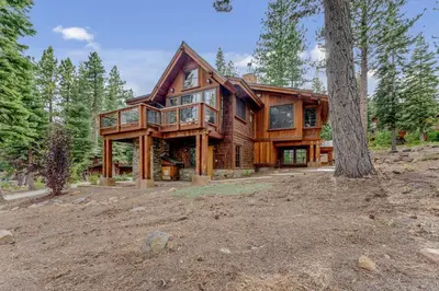 a large wooden house in the woods at Northstar Hideaway-Private Hot Tub, Shuttle Access in Truckee