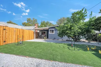 a small yard with a backyard with a house at Main Street Retreat in Roseville