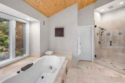 a large bathroom with a tub and a shower at Luxury Tahoe Vacation Rental with HotTub & Lake Views in Tahoe Vista