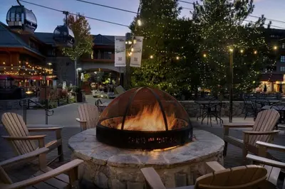 a fire pit in the middle of a patio at Marriott Timber Lodge Luxury Studio in Stateline