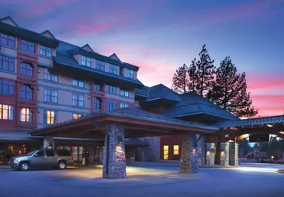a hotel with a car parked in front of it at Marriott Timber Lodge Luxury Studio in Stateline