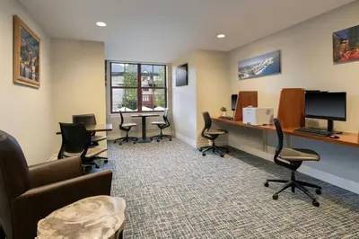an office with chairs and a desk with a computer at Marriott Timber Lodge Luxury Studio in Stateline