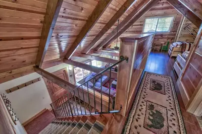 an overhead view of a staircase in a cabin at Tahoe Townie - Cozy Cabin in South Lake Tahoe! in South Lake Tahoe