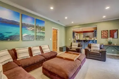 a large living room with a couch and chairs at Elegant 6 Bed Sleeps 14 - Best for families w kids in South Lake Tahoe