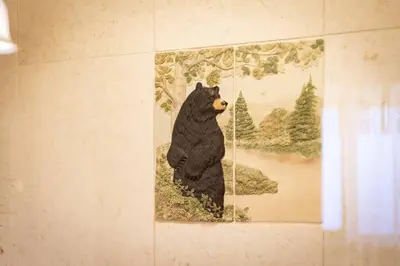a picture of a bear hanging on a wall at Bear Claw Trails - Dogs - Awesome Yard - Fire Pit in Lake Tahoe Airport