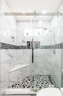 a white bathroom with a shower and a toilet at Remodeled 1 Acre Ranch Home in Madera in Madera