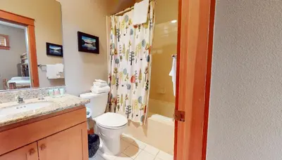 a bathroom with a toilet and a shower at Timbers #27 townhouse in Mammoth Lakes