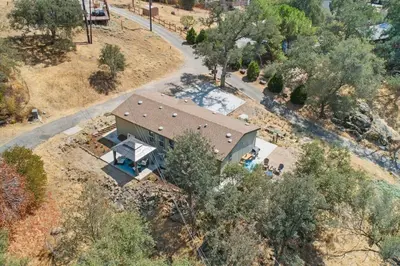 an overhead view of a house with a road at 10 Min Drive to the Sequoias in Three Rivers