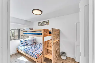 a bunk bed in a room with a bunk bed at Modern Mountain Luxury Retreat, Hot Tub & Grill in Carnelian Bay