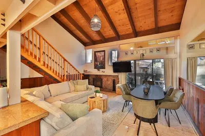 a living room with a couch and a table at The Pad at South Lake Tahoe in Bijou Park
