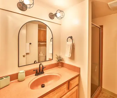a bathroom with a sink and a mirror at The Pad at South Lake Tahoe in Bijou Park