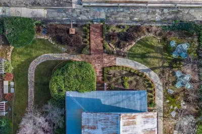 an overhead view of a garden with a pool at Romantic Victorian Getaway The Blue Room in Sutter Creek