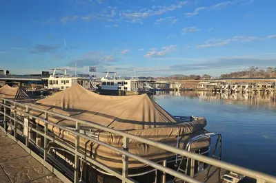 a boat docked at a dock with a tarp on it at Lakeview Dome in La Grange