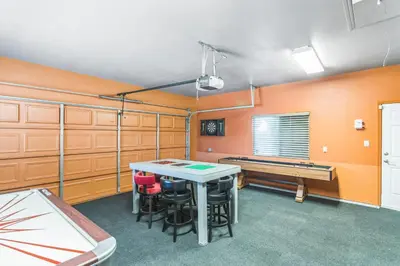 a ping pong room with a ping pong table in it at Beautiful Sunsets at 3BR Villa in Reno in Reno