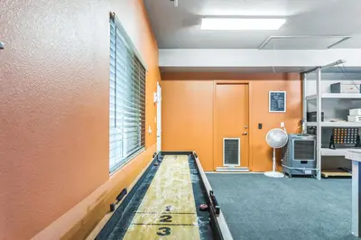 an empty room with a pool table in a room at Beautiful Sunsets at 3BR Villa in Reno in Reno