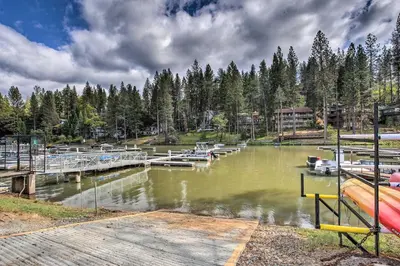 a marina with boats parked in the water at 1 Mi to Pine Mountain Lake Marina Yosemite Cabin! in Groveland
