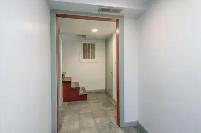 an empty hallway with a hallway leading into a room at New Cabin in North Lake Tahoe! in Kings Beach